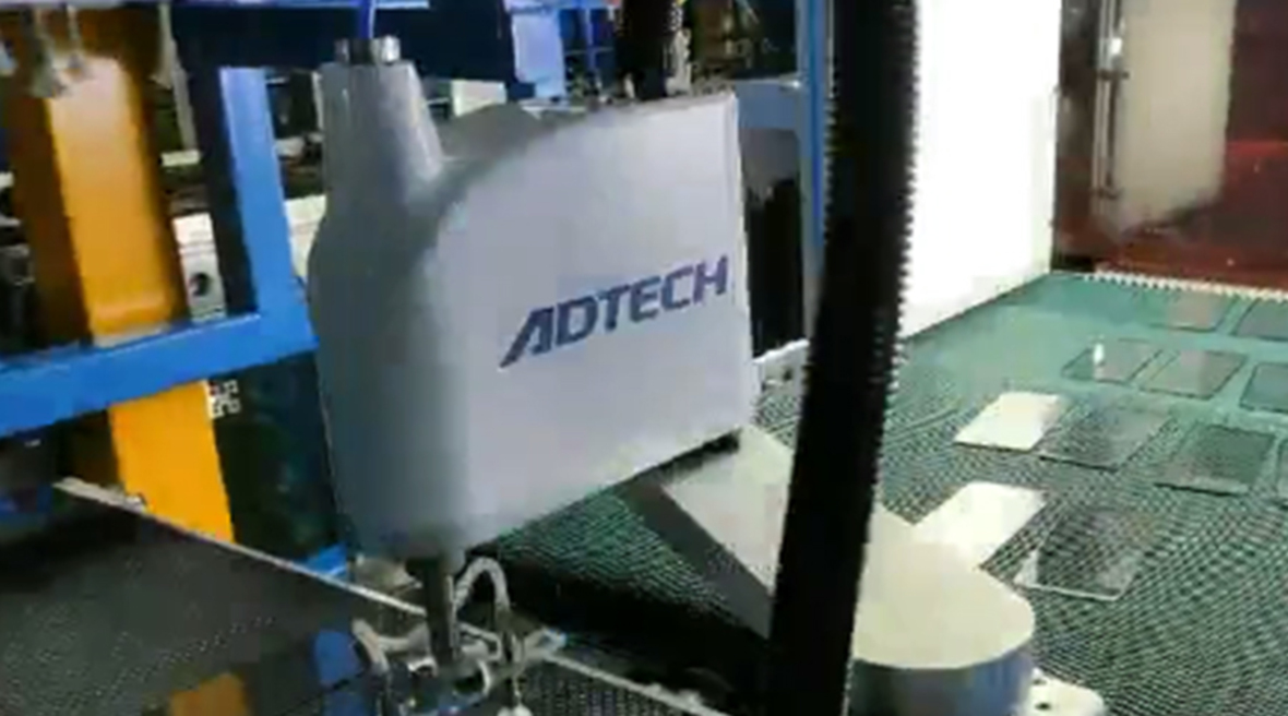 ADTECH cell phone glass processing loading and unloading automation solutions
